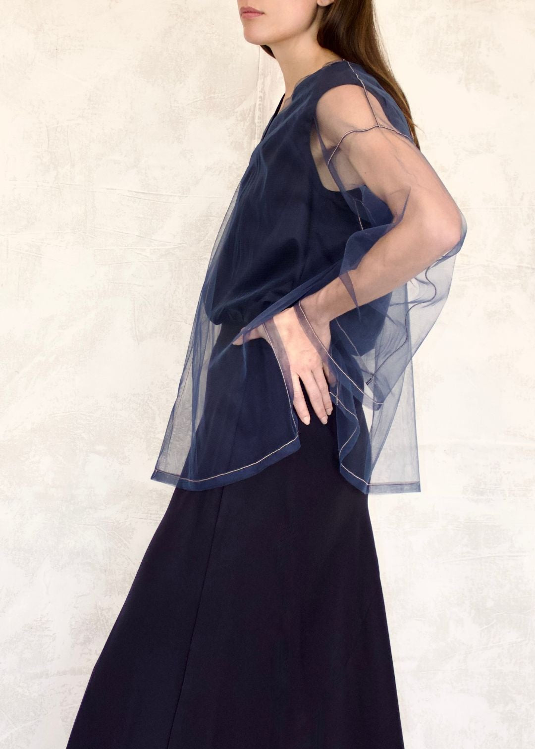 blue v-neck sleeveless cotton top with sheer long sleeve