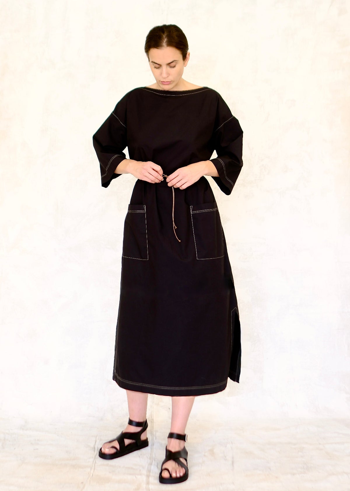 Black Dress belted with cord front view
