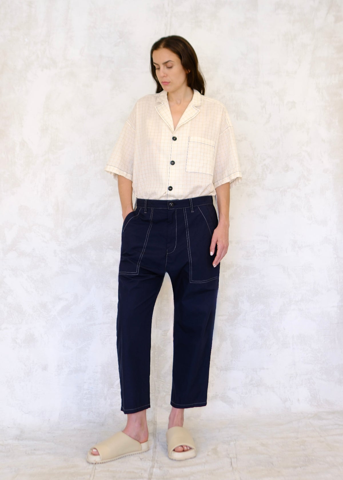 cropped navy poplin pants with contrast stitching button waist, pockets