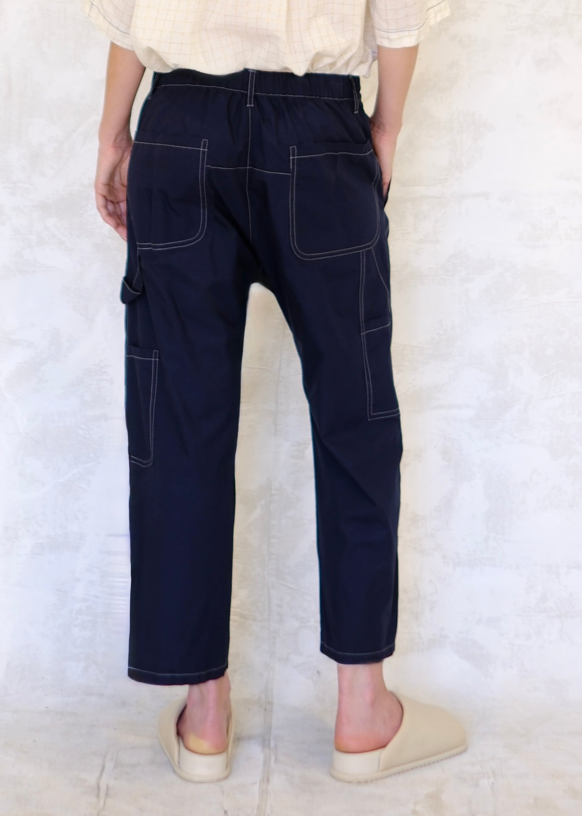 back view navy poplin pants with contrast rear pockets, tool pockets and tool loop