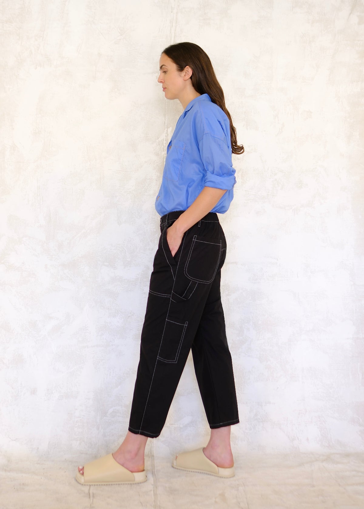 side view navy poplin pants, contrast stitching, rear pockets, tool pockets, tool loop