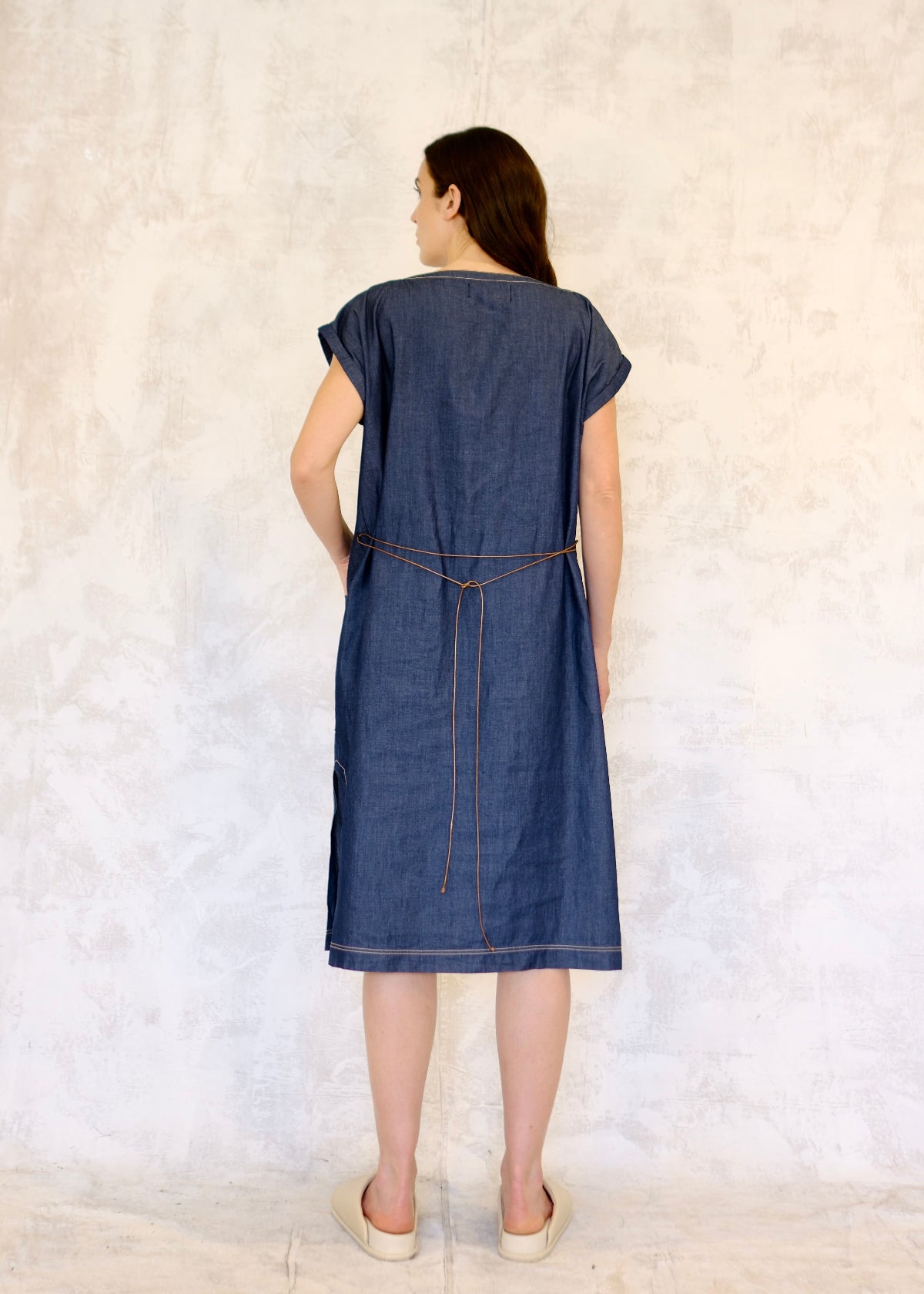 loosely belted denim boat neck dress rear view