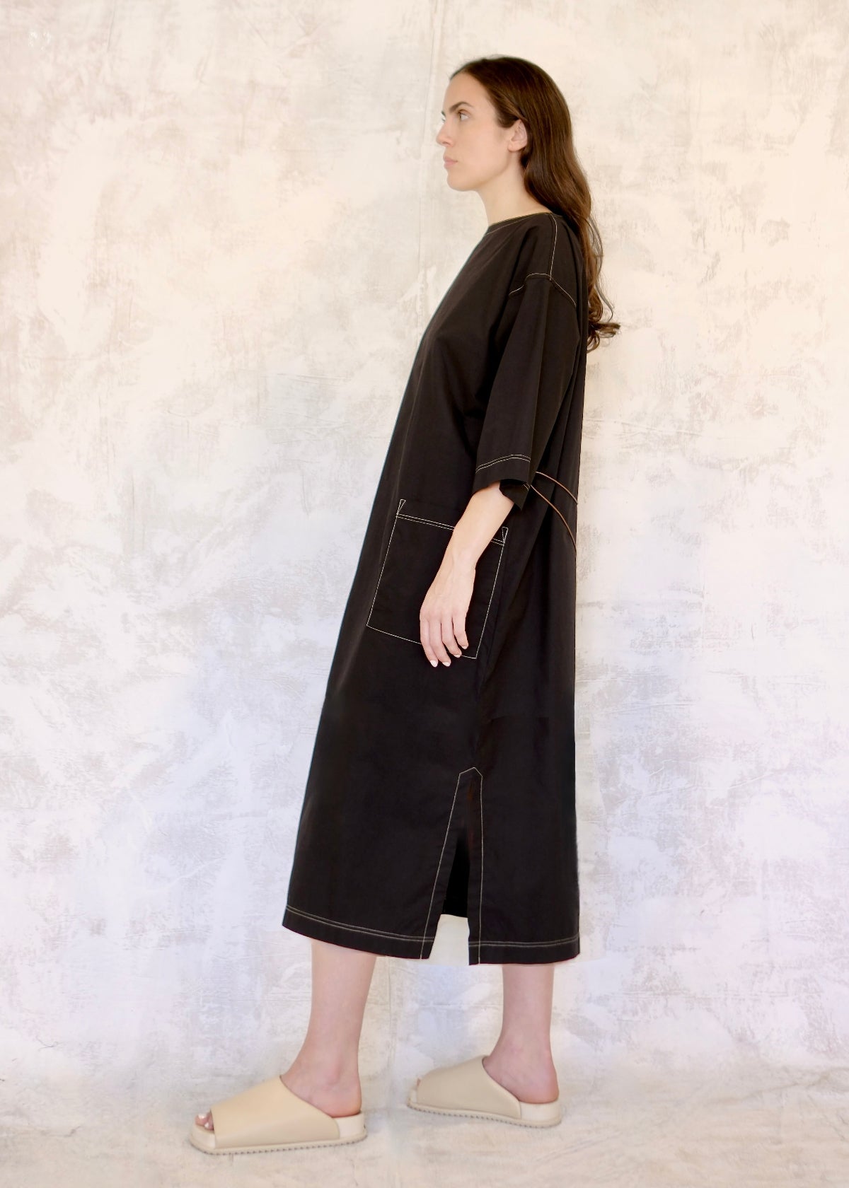 Black Dress midi side view with pocket and slit