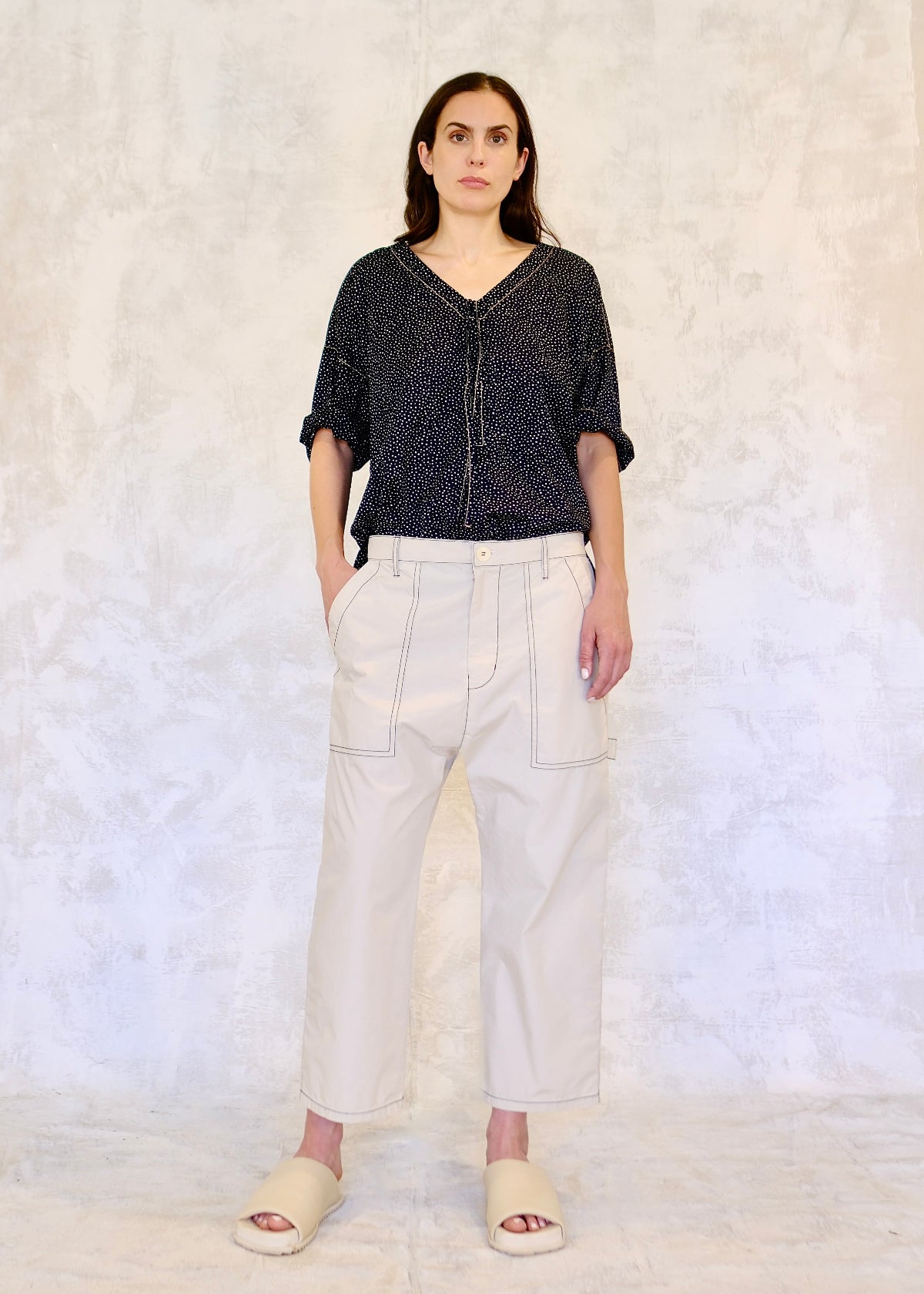 white poplin pants navy pullstring short sleeve top