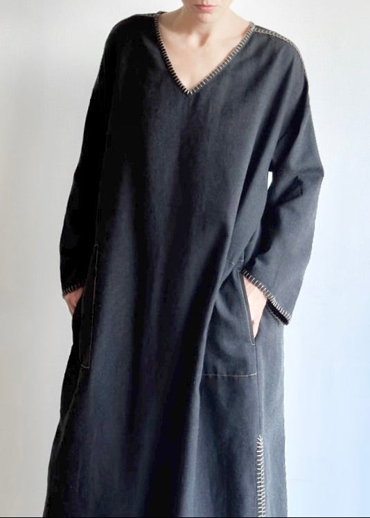 Front 3/4 image of model in the Flannel Poet Dress in-seam pocket and hand-finished edge stitching.
