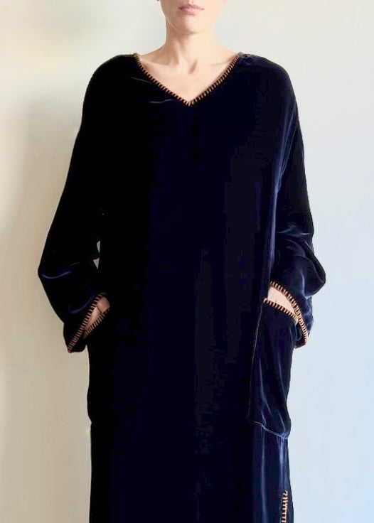 Velvet Poet Dress in cotton–tencel velvet, shown in front view with V-neckline and long sleeves, hands in patch pockets