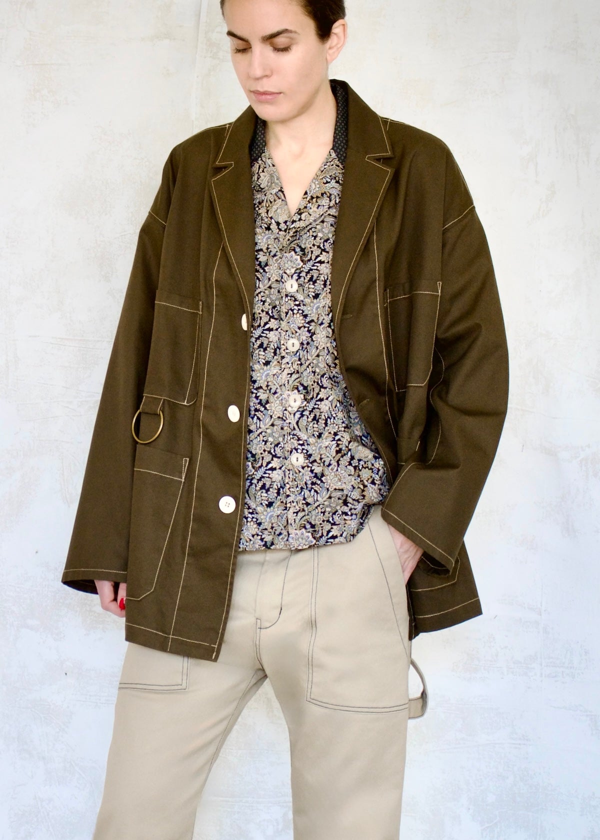 olive cotton utility jacket with collar button closure oversize fit