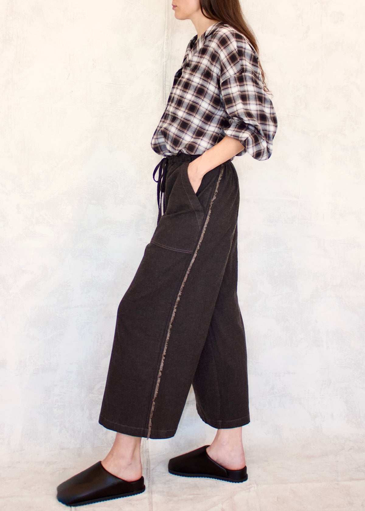 draw string patch pockets cotton pants brown with plaid shirt side view