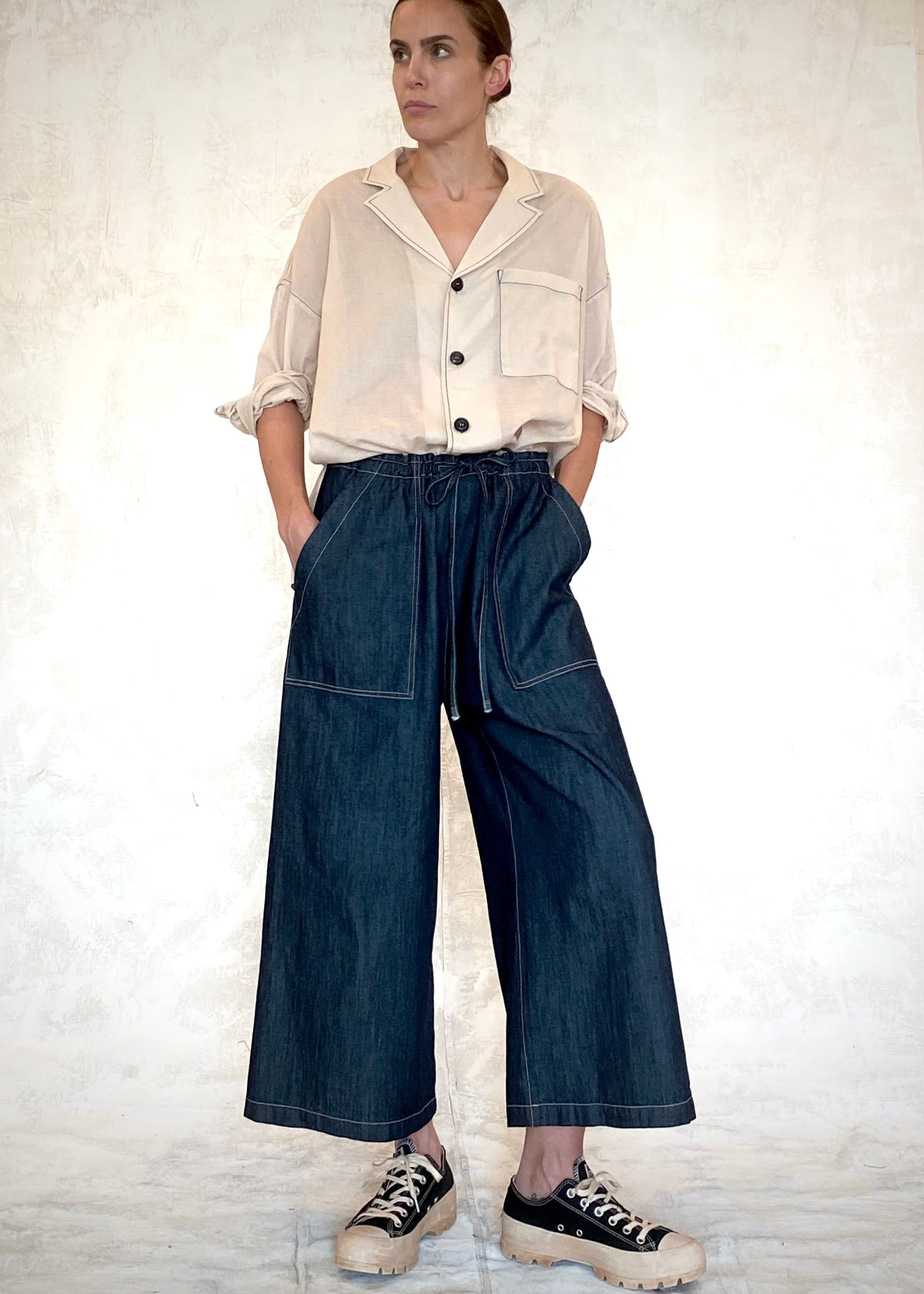 denim drawstring jeans with beige button down top