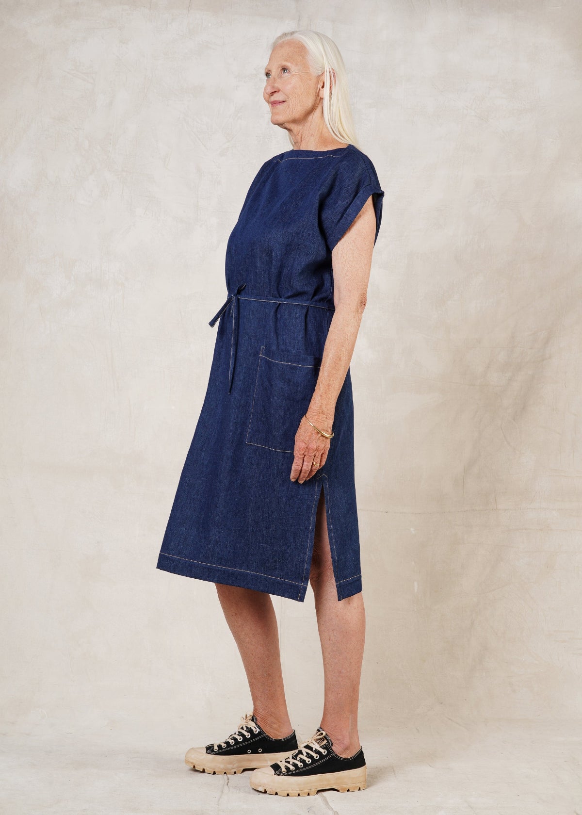 belted denim boat neck dress side view with pocket