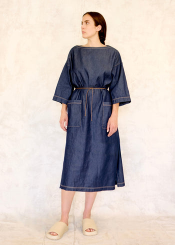 boat neck denim dress with tie belt and 2 pockets front view