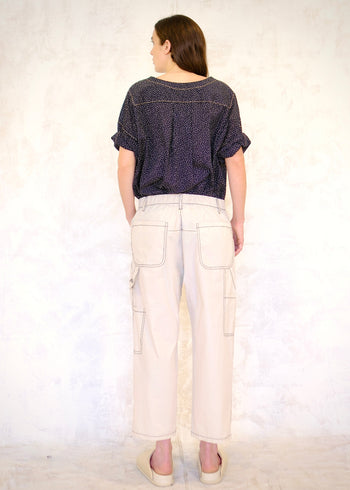 rear view of white poplin pants, pockets, tool pockets, tool loop