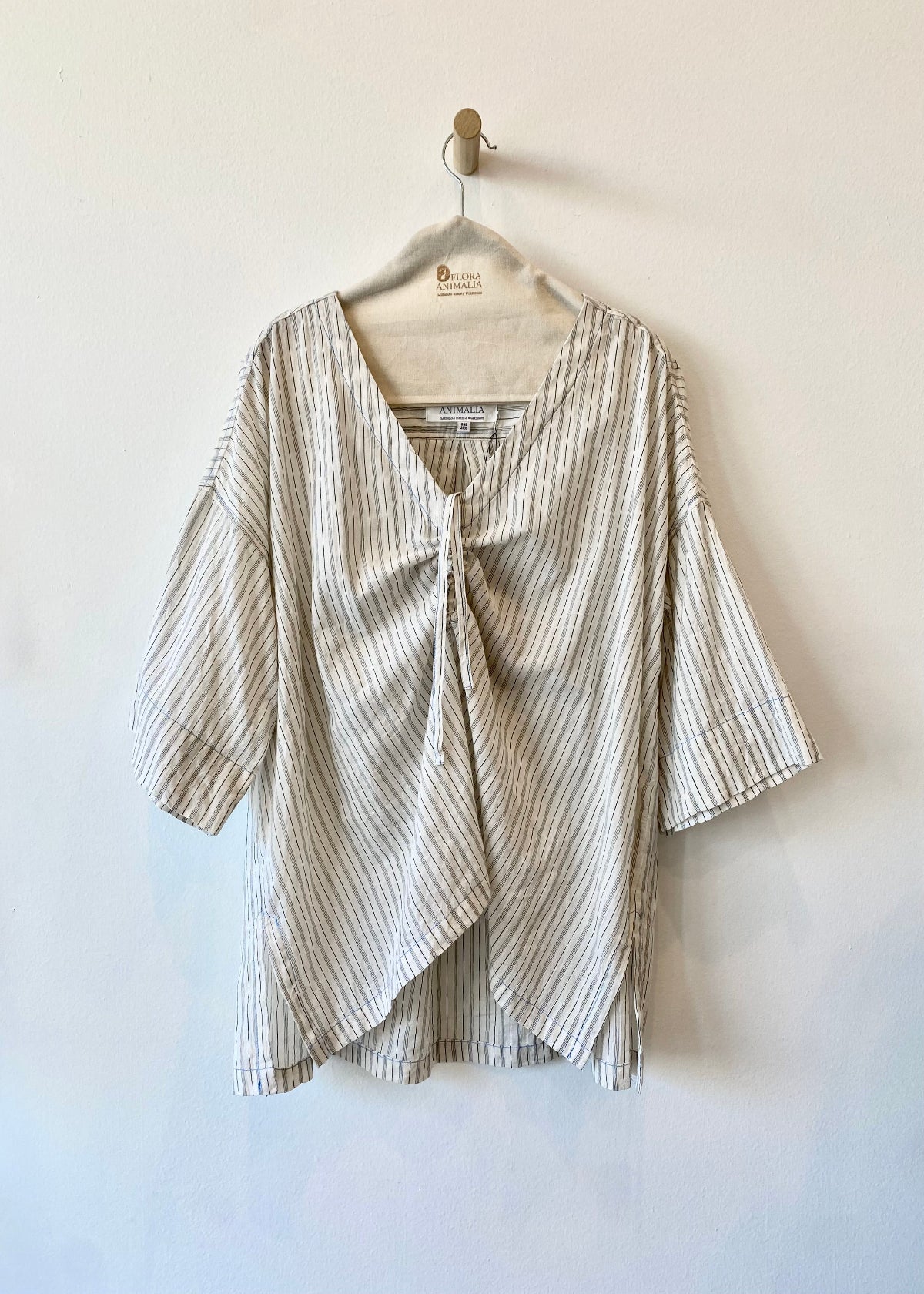 striped top with relaxed elbow length sleeves