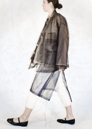 sheer half apron with sheer front pockets and tie waist with matching sheer jacket