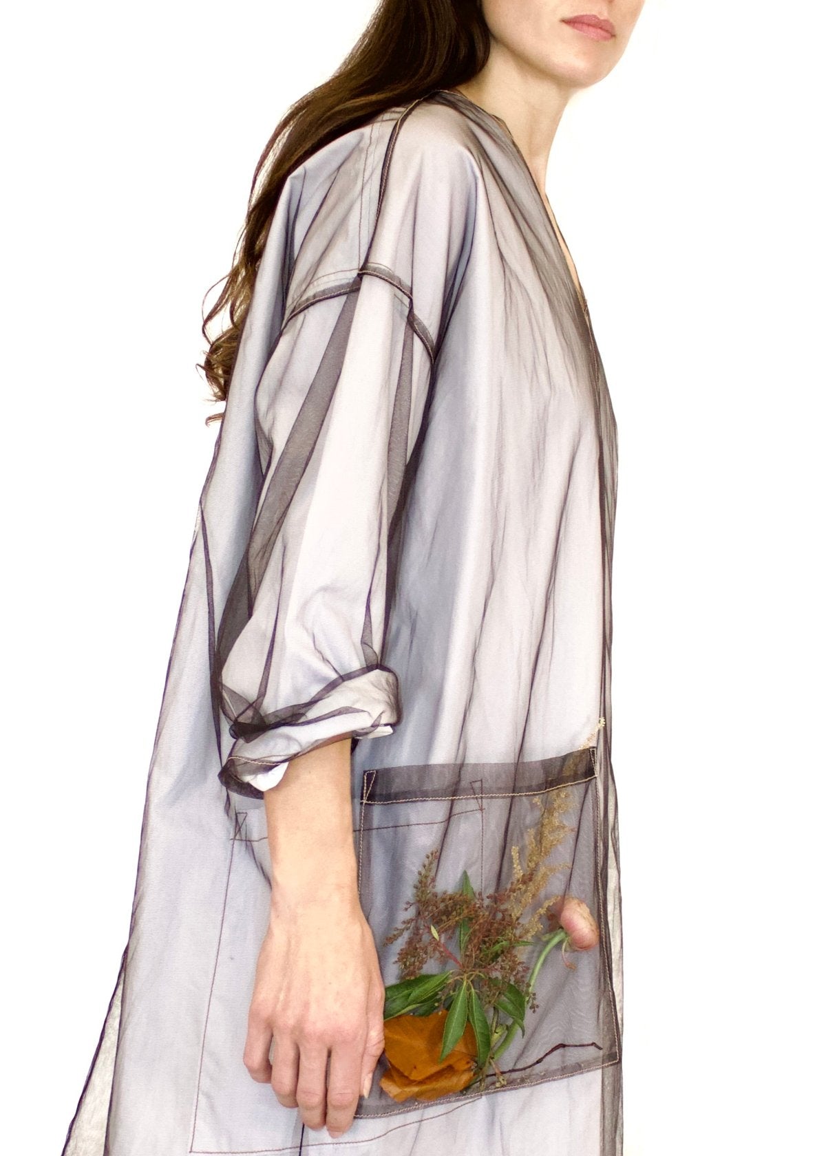 Pepper Tulle Lanatus Dress Layered over Agnes dress hands in pockets