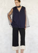 black pepper tulle harvest top over navy v-neck camisole front