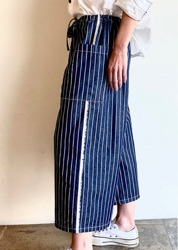 blue and white striped denim cropped drawstring pants, pockets and raw side seam