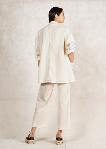 oat cotton utility jacket oversize with matching natural denim pants rear