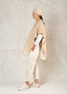 wheat color pull over fleece poncho with stitching  side view