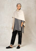 wheat color fleece poncho open front with stitching wrapped over shoulder