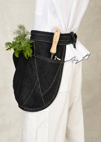 short denim apron with large front pouch pocket  close up